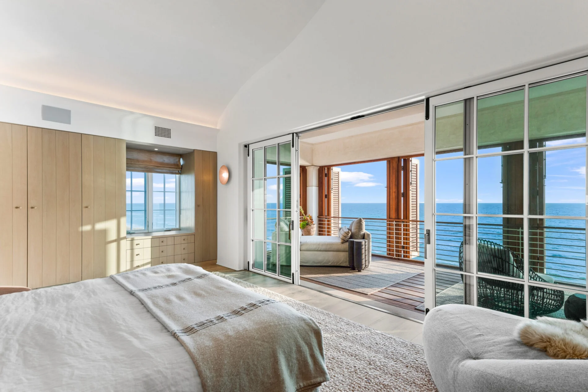 Gulf-Front Grandeur – Interior Master Bedroom with Sliding Doors interior master bedroom with sliding doors at Gulf-Front Grandeur