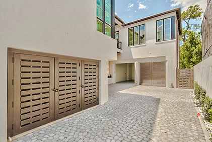 E.-F.-San-Juan-Alys-Beach-Custom-Windows custom millwork, florida millwork, architectural millwork, 30A florida millwork, family business, alys beach florida, loewen windows and doors, liftslide doors, hurricane rated doors, impact rated doors and windows