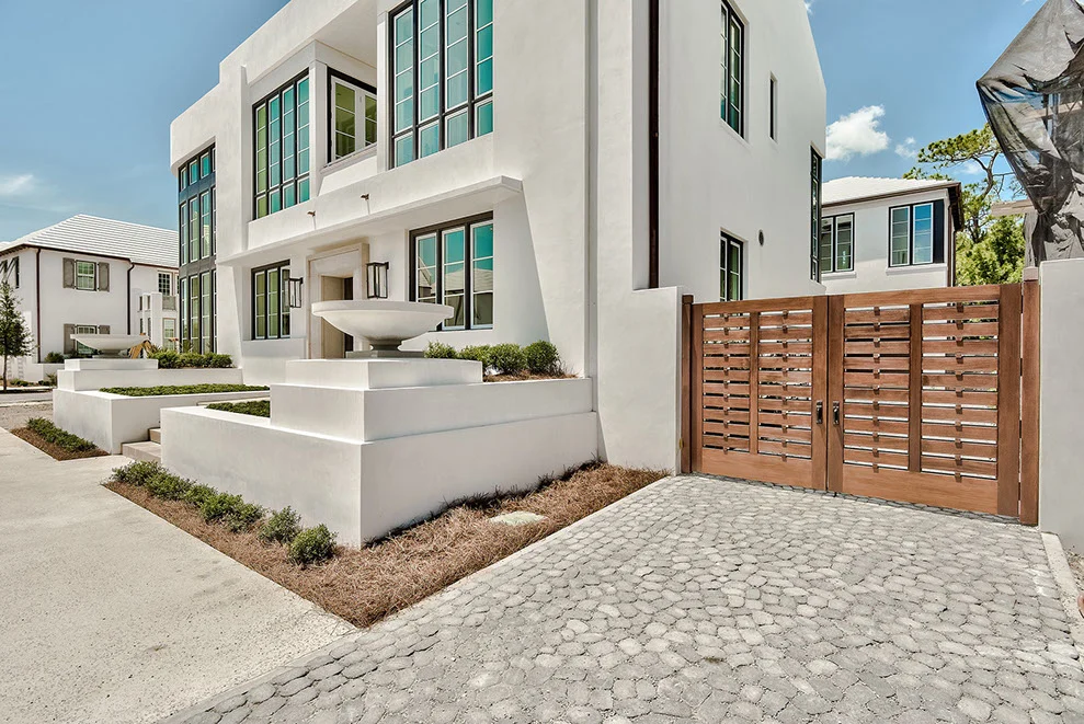 A Window to the World – Exterior Front Home with Custom Gate exterior front home with custom gate with A Window to the World