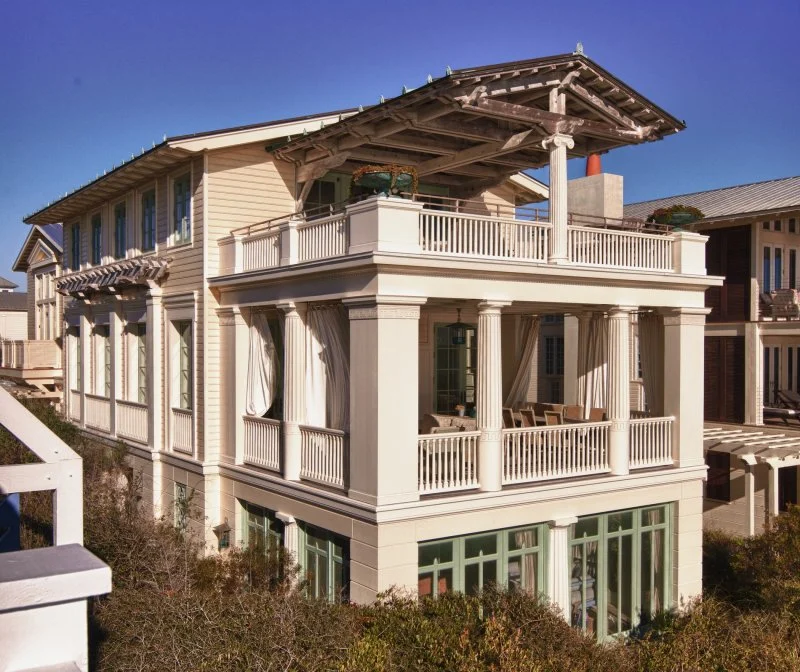 Wooden Classicism – Multi-Level Exterior View e f san juan, multi-level exterior view of the Wooden Classicism in Seaside, exterior architectural millwork, corbelled rafter tails, exposed rafter tails, coastal architecture, seaside florida, 30A, south walton, walton county, northwest florida