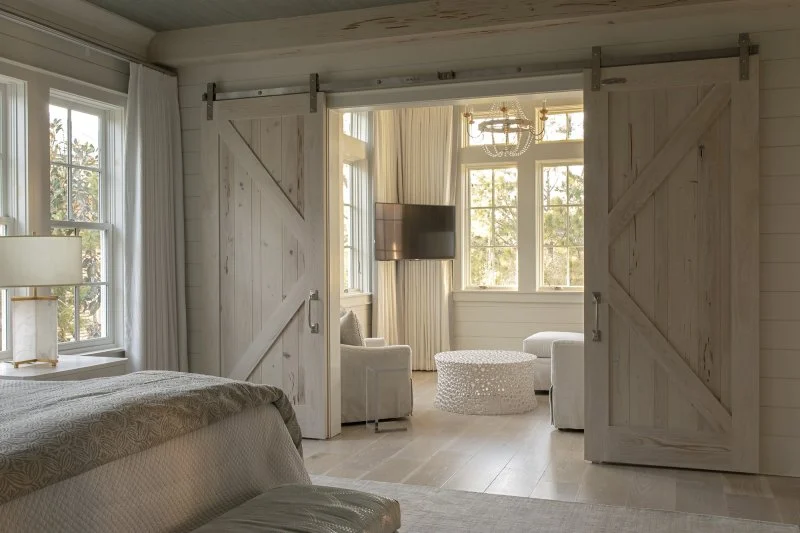 Southern Beach Getaway in WaterColor – Custom Interior Barn Door in Bedroom custom interior barn door in bedroom at the Southern Beach Getaway in WaterColor