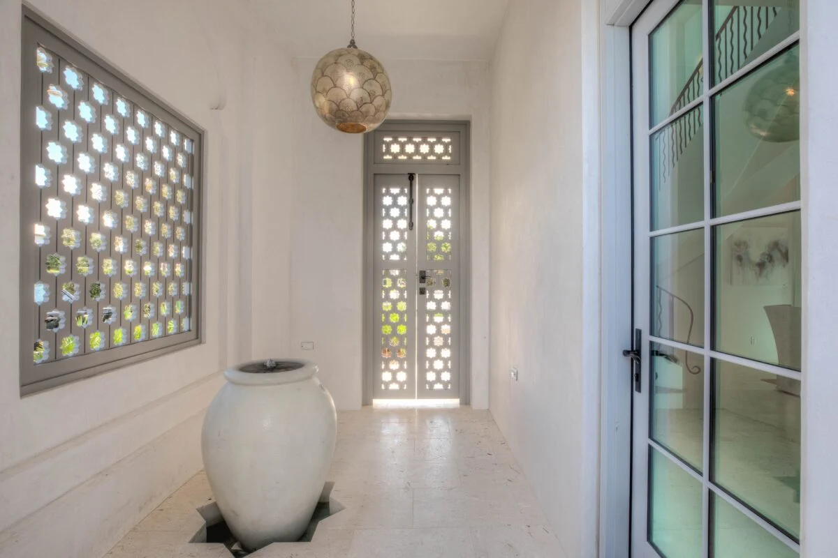 E. F. San Juan – Florida Millwork, Gates & Cabinetry Flower pattern custom screens and gates by Florida millwork manufacturer E. F. San Juan