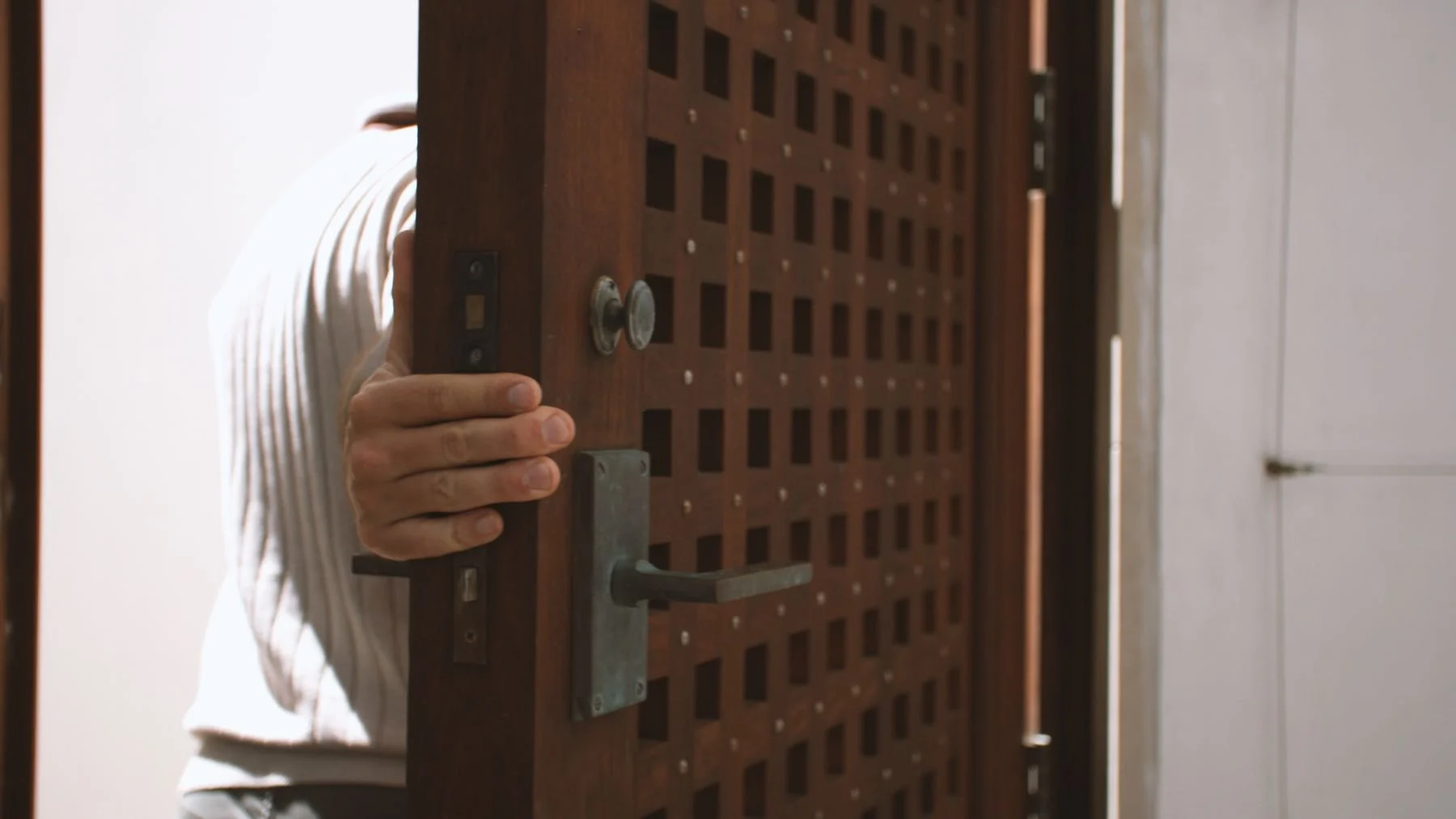 Alys Beach Ipe Gate – E. F. San Juan Custom architectural gate system made of ipe hardwood in Alys Beach, Florida