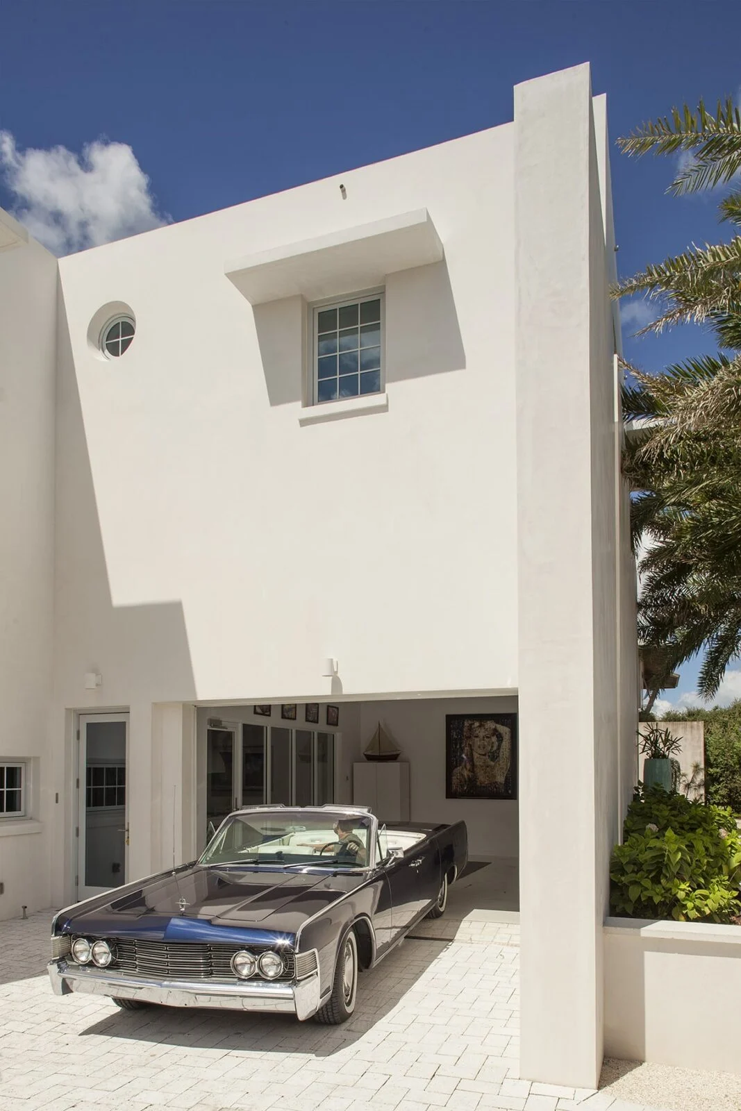 Loewen Windows Above Garage – E. F. San Juan Loewen Windows and Doors by E. F. San Juan above the garage of a Gulf-front home in Santa Rosa Beach, Florida