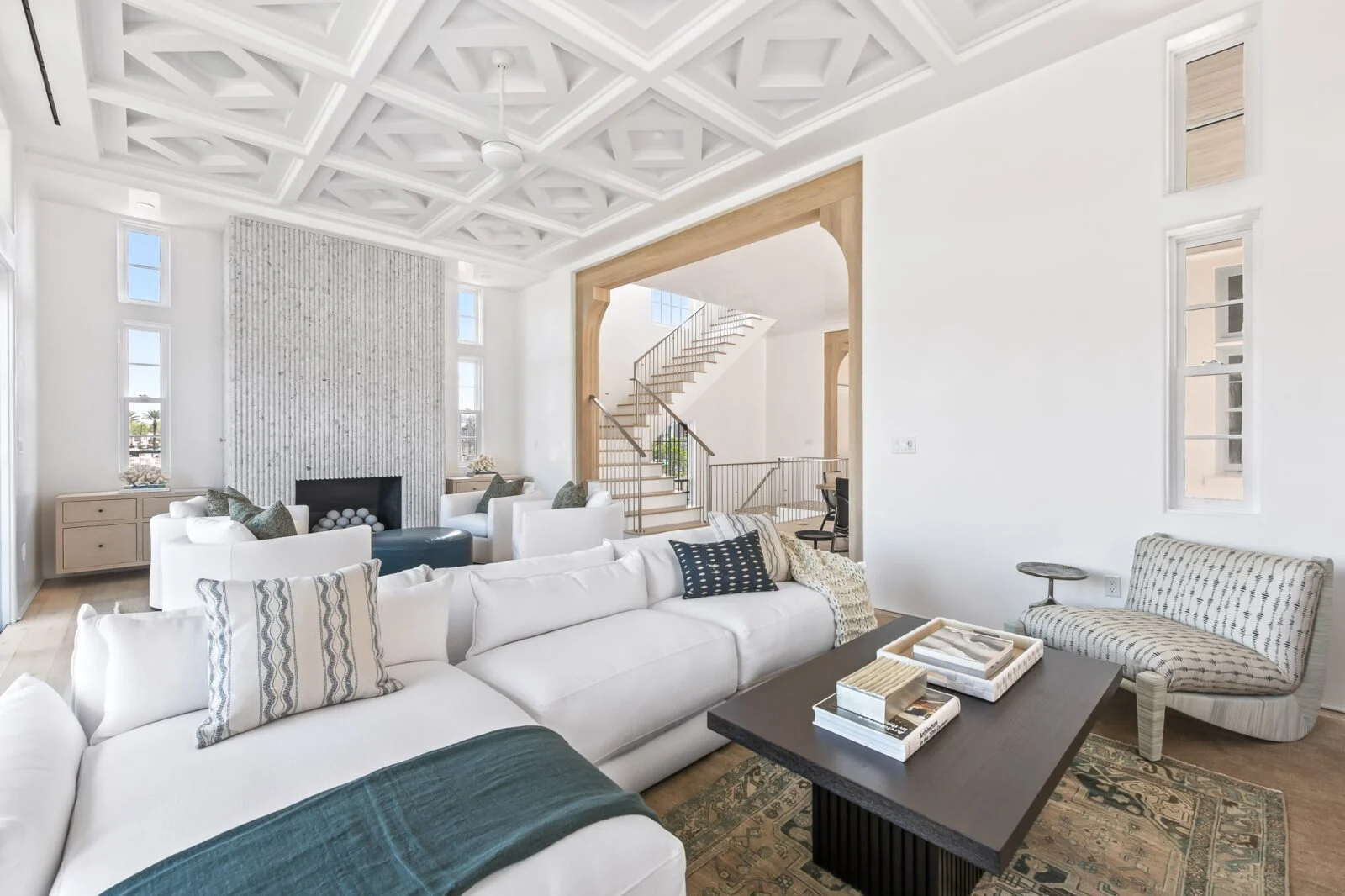 Old Cellar Lane Living Area View – Alys Beach Millwork by E. F. San Juan Custom trim, entryway casings, and ceiling millwork by E. F. San Juan in Alys Beach