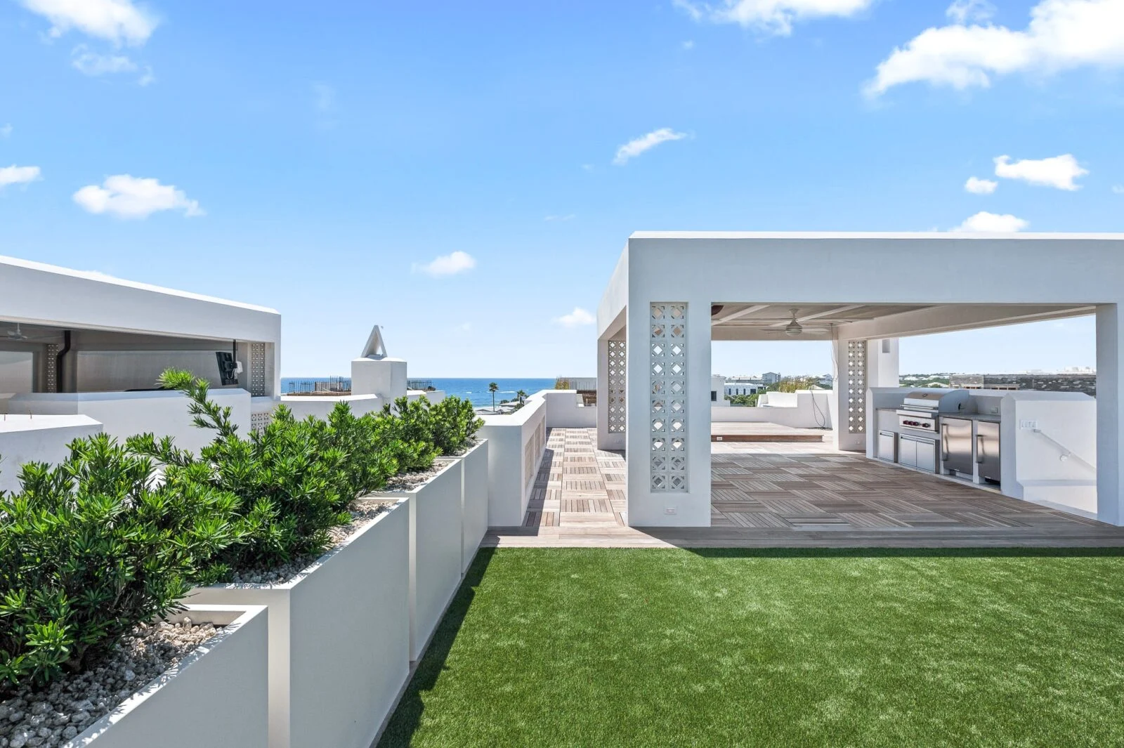 Old Cellar Lane Rooftop Deck View – Alys Beach Millwork by E. F. San Juan View of the Gulf from rooftop of Alys Beach home with custom millwork and decking by E. F. San Juan