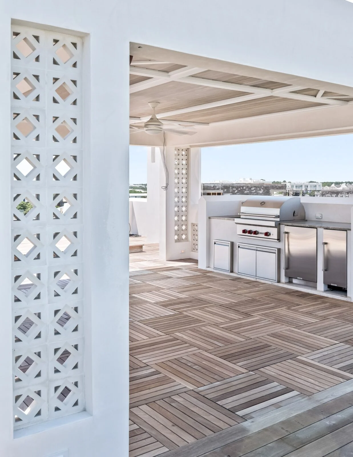 Old Cellar Lane Outdoor Kitchen – Alys Beach Millwork by E. F. San Juan E. F. San Juan custom decking in Alys Beach Florida on Old Cellar Lane custom home