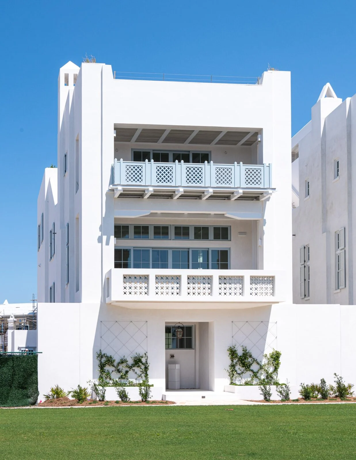 Old Cellar Lane Exterior Facade – Alys Beach Millwork by E. F. San Juan Custom millwork through Alys Beach Florida home with Loewen windows and doors