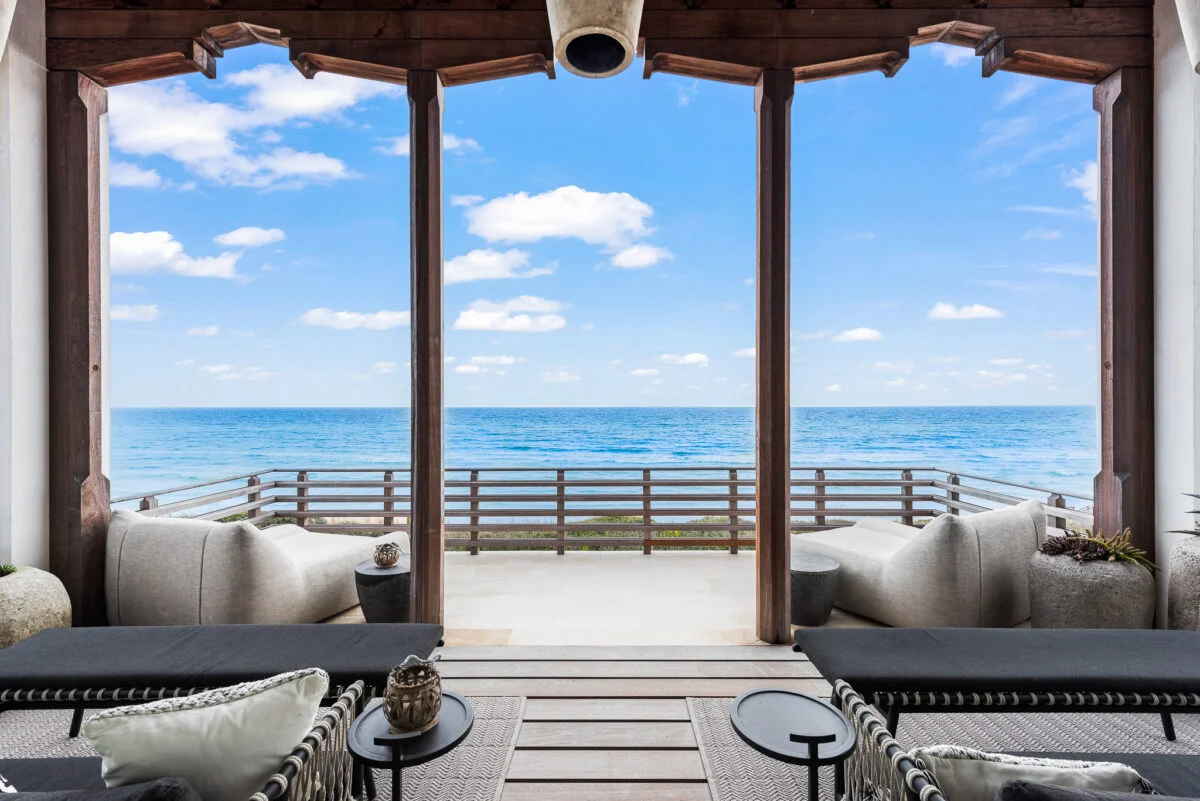 Gulf-Front Grandeur – Exterior View Towards Beach exterior view towards beach with custom millwork at Gulf-Front Grandeur