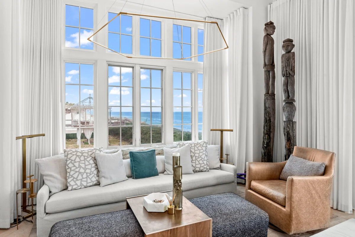 Gulf-Front Grandeur – Interior Living Room with Impact-Rated Windows interior living room with impact-rated windows at Gulf-Front Grandeur