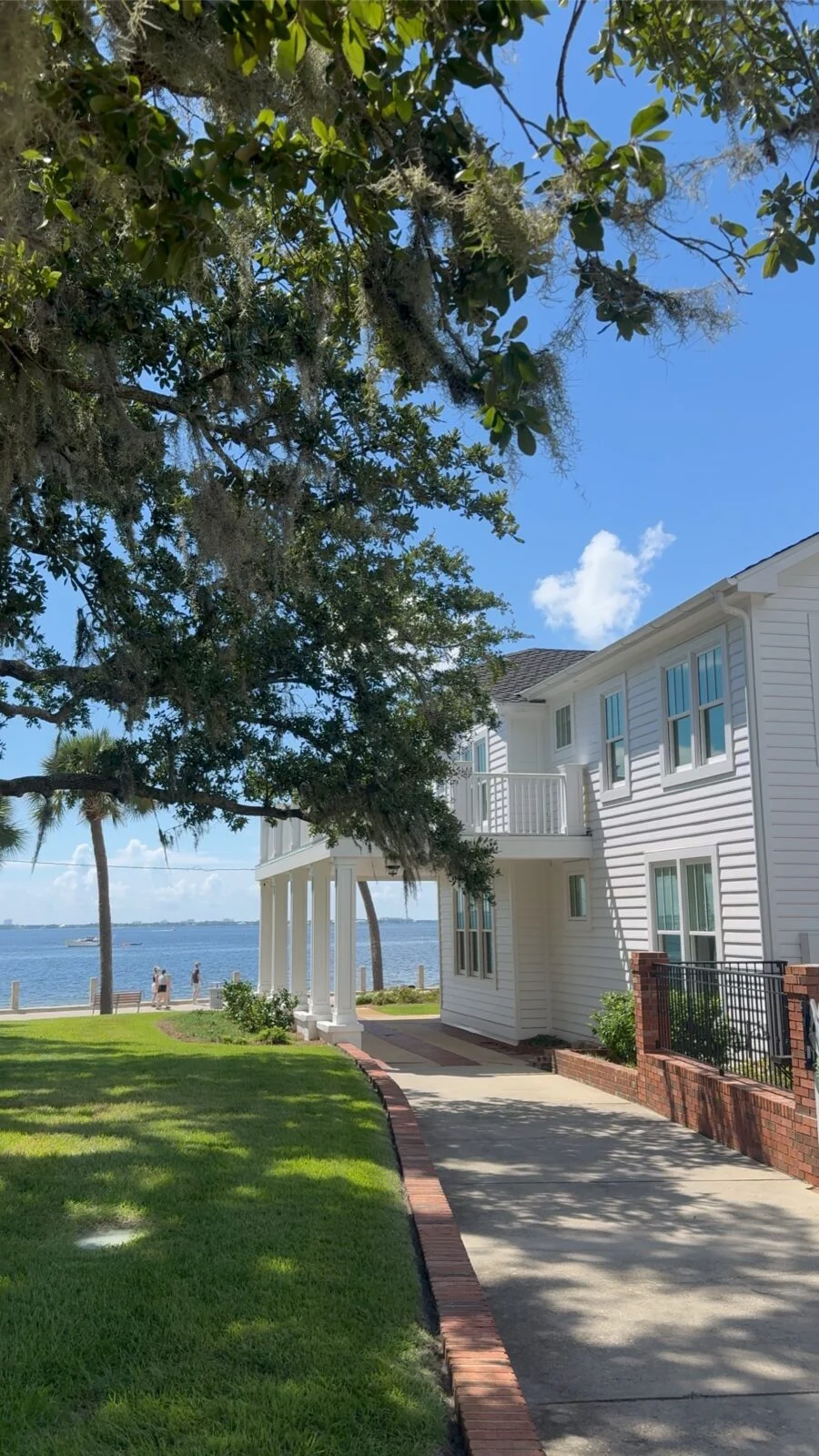 Historic Home Renovation in Panama City – Exterior and Driveway Side view and driveway of historic 100-year-old home on St. Andrews Bay, Panama City, Florida