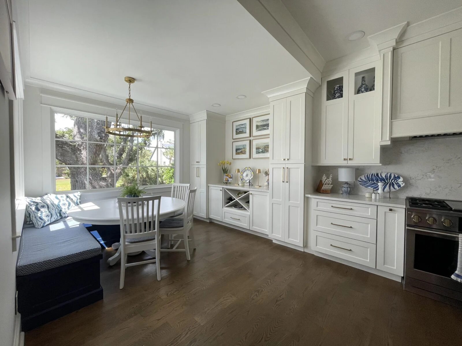Historic Home Renovation in Panama City – Dining Room Built-Ins Custom cabinetry and shelves by E. F. San Juan in a 100-year bayfront home in Panama City provide a modern update that preserves the history