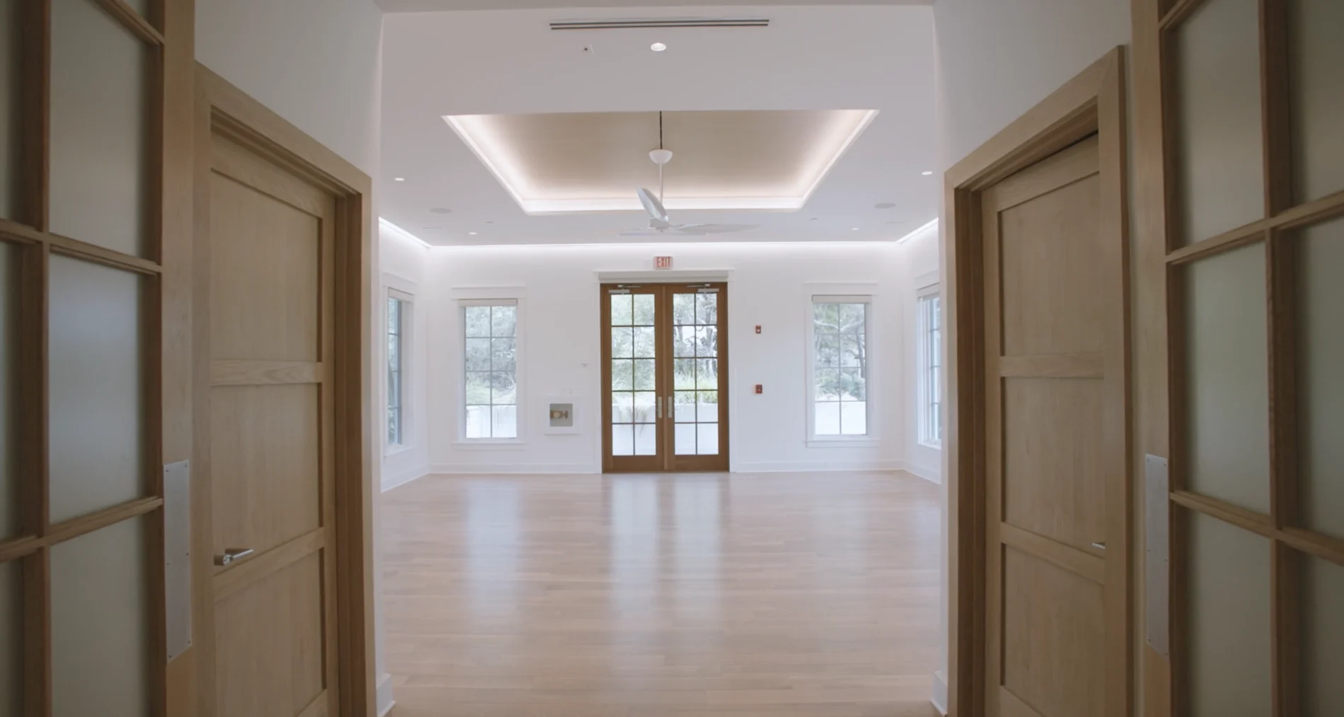 Seaside Athletic Center Workout Class Area Interior doors, exterior doors, and trim by E. F. San Juan created for Seaside Athletic Center in Seaside, Florida, ceiling light cove, floating ceiling